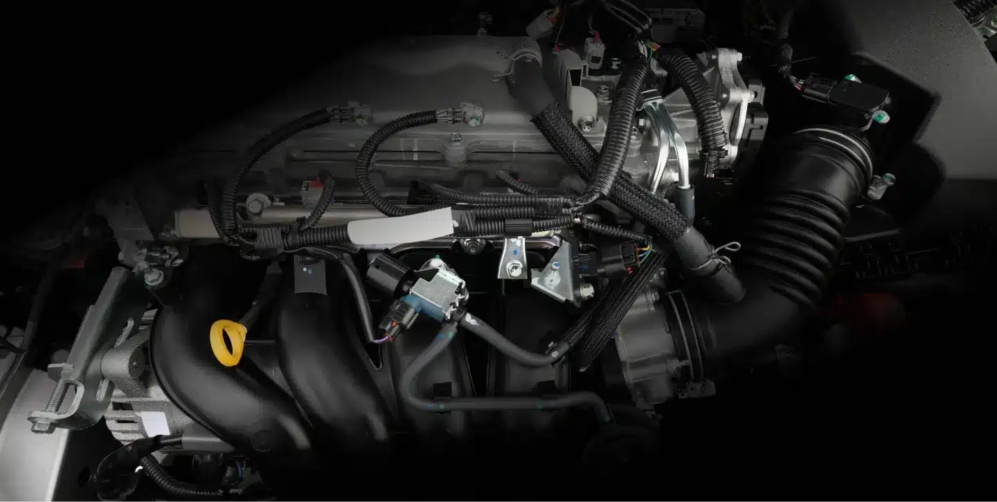 auto repair in St. Charles, IL by Precision Motorworks. Image of a modern car engine with wiring and components exposed, reflecting the shop’s precision diagnostics and commitment to reliable performance and vehicle safety.