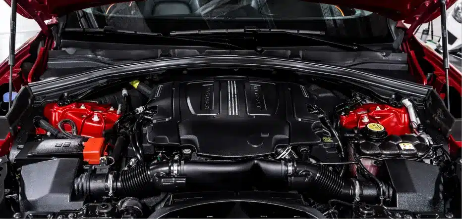 Jaguar repair in St. Charles, IL by Precision Motorworks. Image of a Jaguar engine bay, emphasizing the shop’s expertise in luxury European auto repair with a focus on precision, performance, and long-term reliability.