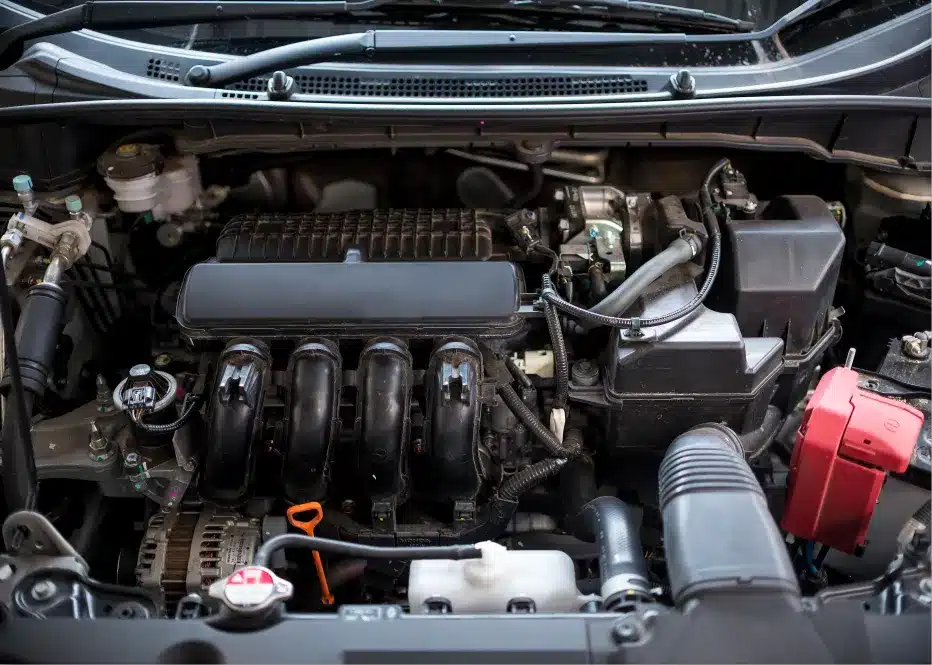 Vehicle maintenance in St. Charles, IL by Precision Motorworks. Image of a car engine bay during service, showcasing the shop’s dedication to preventative maintenance, reliable performance, and long-term vehicle safety.
